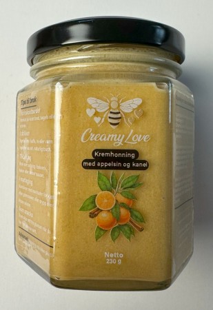 Kremhonning med appelsin og kanel. 230g